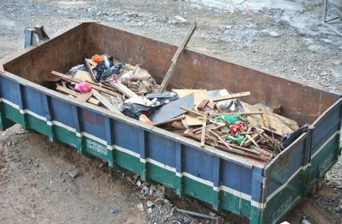 Waste removal truck and cityscape in Watford