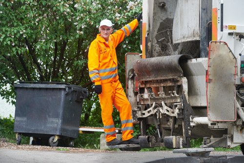 Homeowner preparing the garden for clearance services in Watford